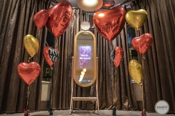 Rustic Mirror Booth with heart balloons